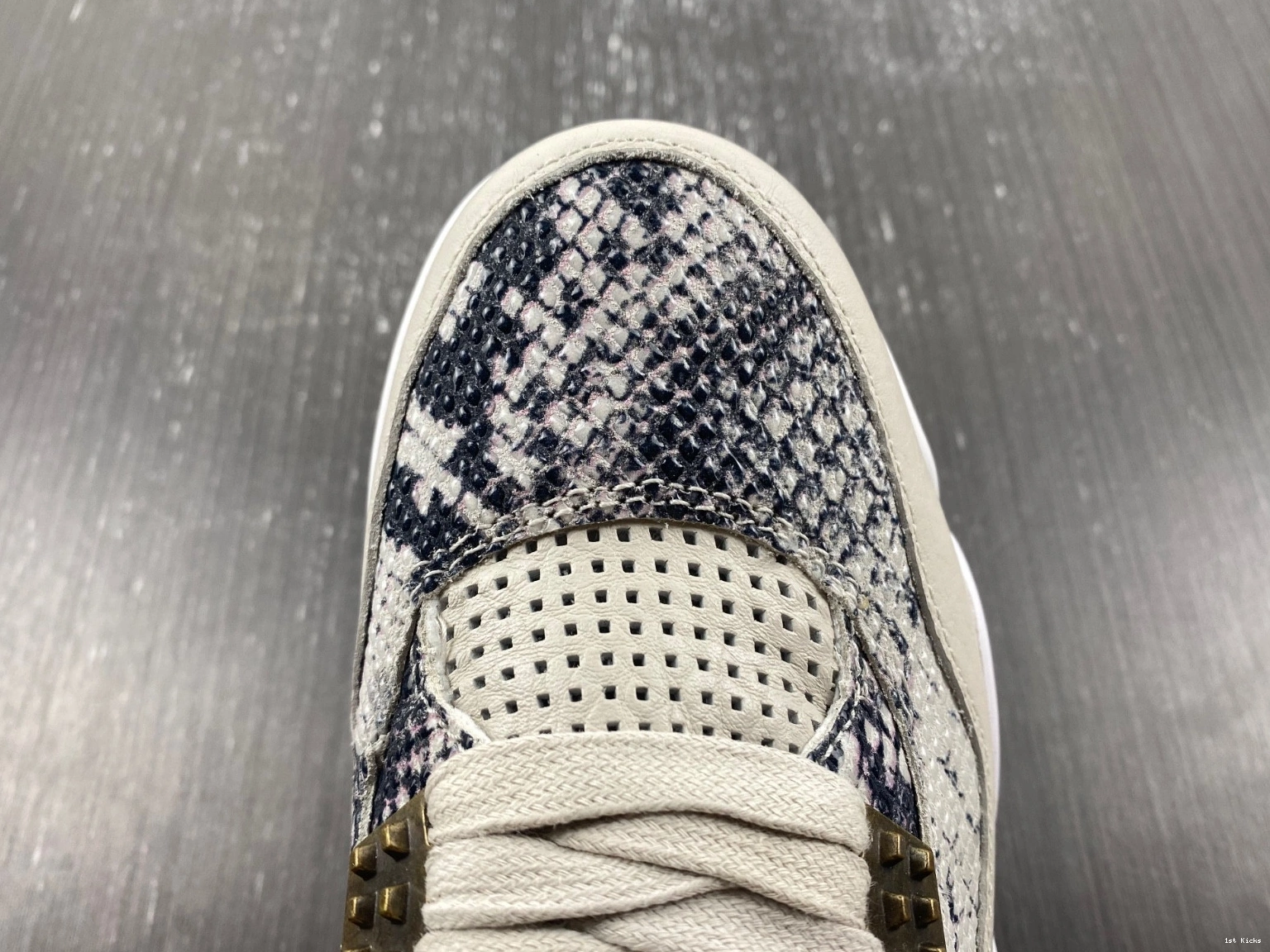 - 819139-030 Retro Snakeskin Jordan 4 1225